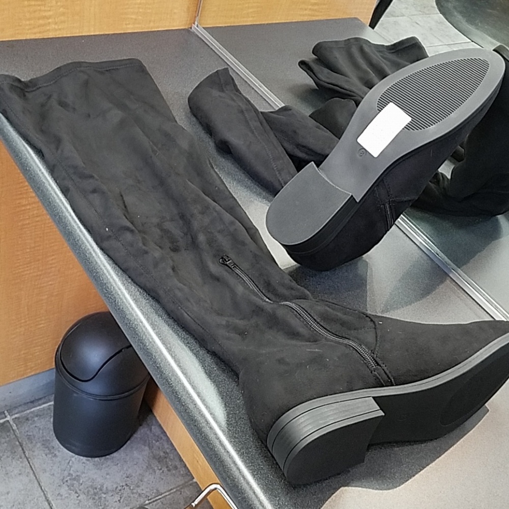 Tall black boots